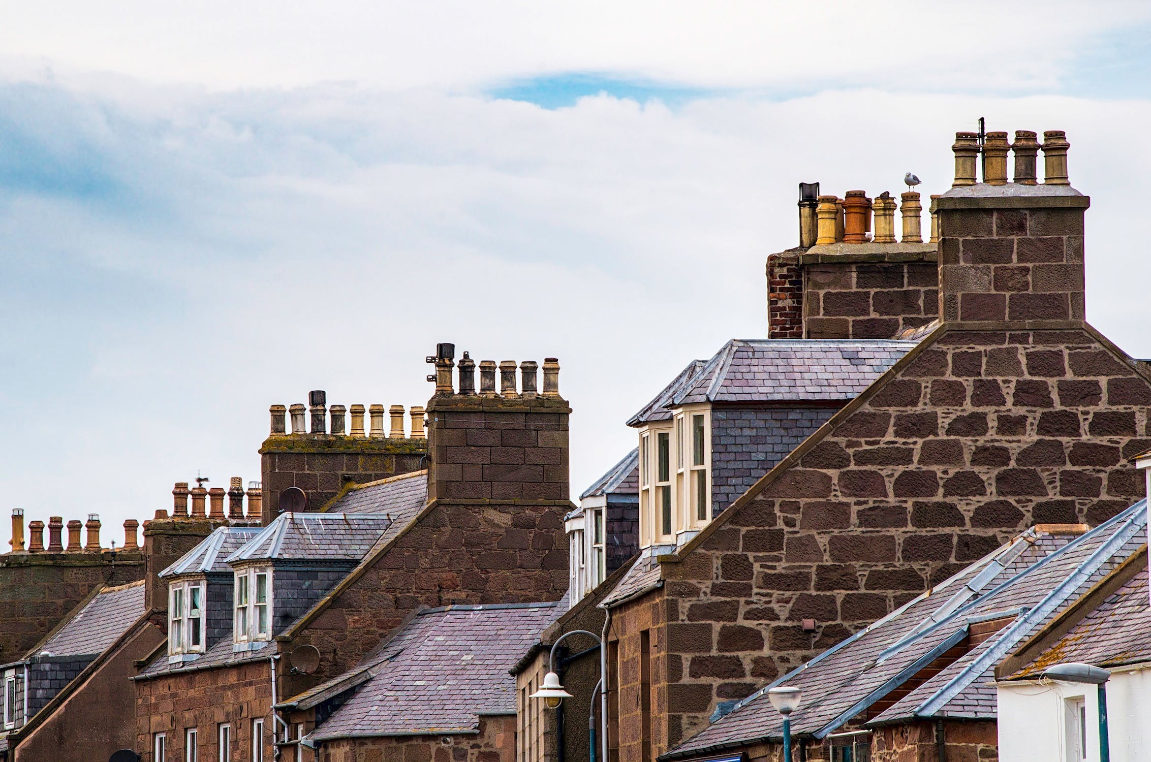 brick chimneys on buildings.