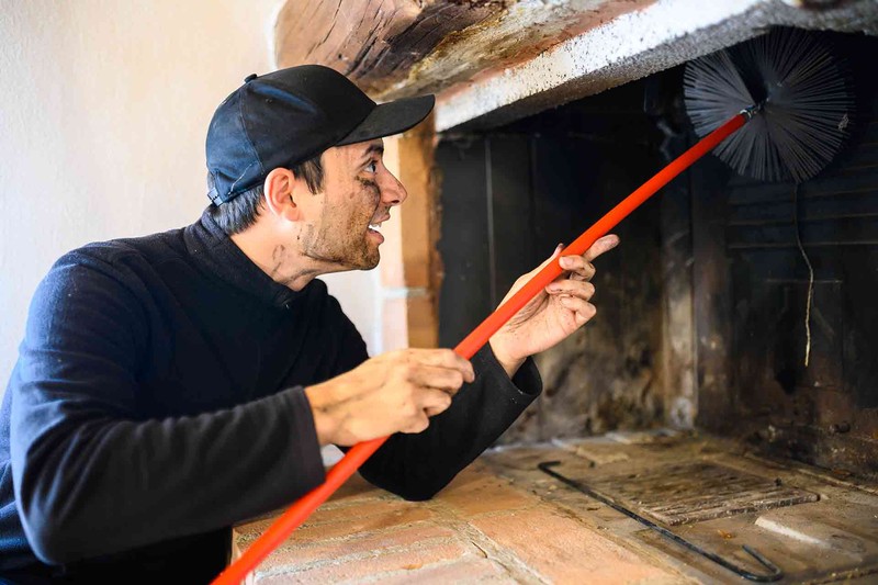 Chimney Sweeping: The Key to Preventing Costly Repairs